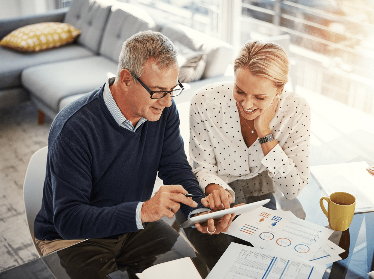Senior couple reviewing documents together